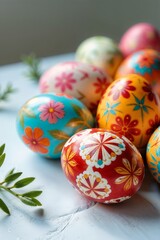 Ornately decorated Easter eggs in vibrant hues, representing festive spring traditions, against a soft pastel backdrop