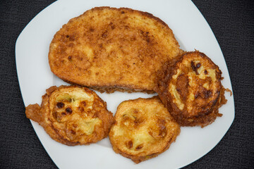 Plate with fried pumpkin slices with egg, Romania 2024