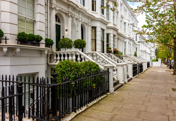 White residential townhouses in Kensington, London, UK