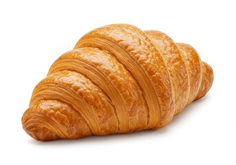 A single golden brown croissant with visible flaky layers and a glossy surface isolated on white background
