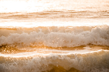 beautiful wave during sunset golden hour orange pretty ocean sea 