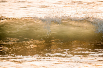 wave ocean surf sunset golden hour sunrise orange