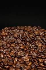 Decaffeinated coffee beans roasted close up