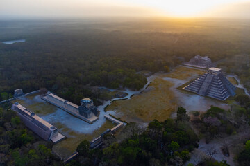  Aerial photography of Chichen Itza maya pyramid in mystic twilight jungle without people..