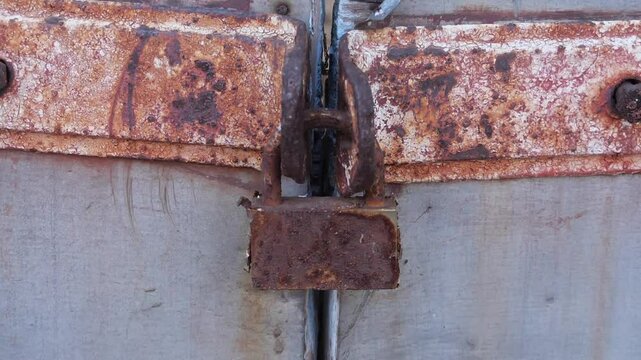old rusty lock on the door 