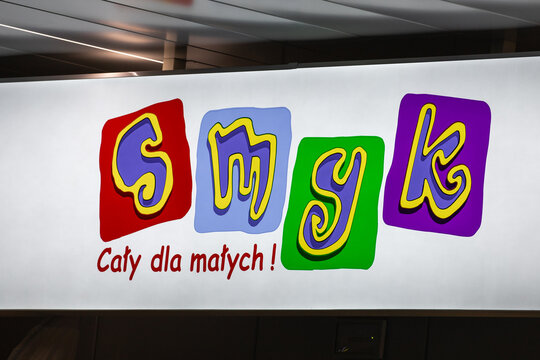 Poland, Garwolin - 1 February, 2025: Smyk store with logo sign. Polish retail chain shop, selling products for infants and children, like toys, clothing and footwear. Signboard with brand logotype.