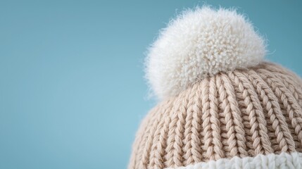 Close-up Beige Knitted Winter Hat Pompom