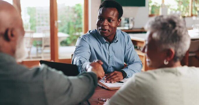 Senior couple, home and consultant with handshake, real estate and financial advisor in lounge. Employee, man and woman with debt review, shaking hands and meeting for retirement fund and agreement