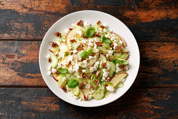 Crunchy Celery, Apple, Cucumber and Feta Cheese Salad. Healthy food.