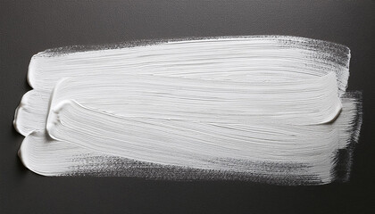 white brush stroke on canvas