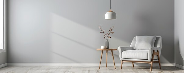 Obraz premium Minimalist gray living room with armchair, side table, hanging lamp, and blank wall for design or product mock-up.