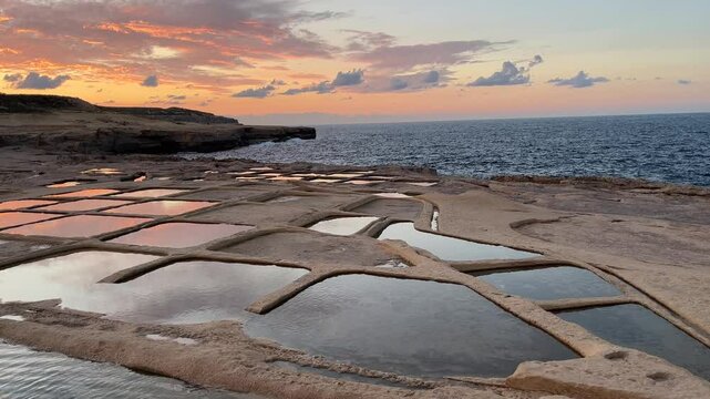 Sea salt marsh at sunset. Sea salt mining.