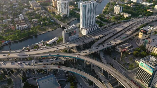 MIAMI, UNITED STATES - FEBRUARY 8, 2025: Busy highways and cityscape capture the vibrancy of urban life in Miami during afternoon rush hour