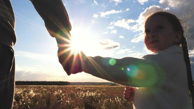 child mother father hand sunset sky, hand mom dad kid girl, happy family childhood dream, concept: children, sunlight, child hand sunset forest park, cheerful child face, friendly family sunset park