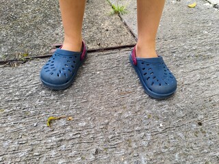 Rubber sandals on child's feet