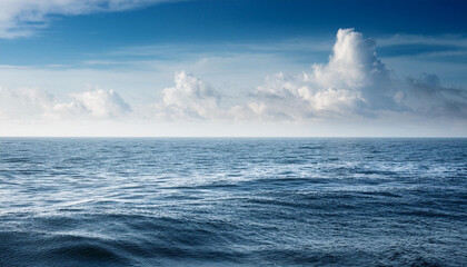far and away on the ocean as the horizon is abstractly white and blending into the water