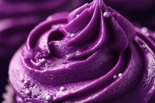Close-up of purple frosted cupcake