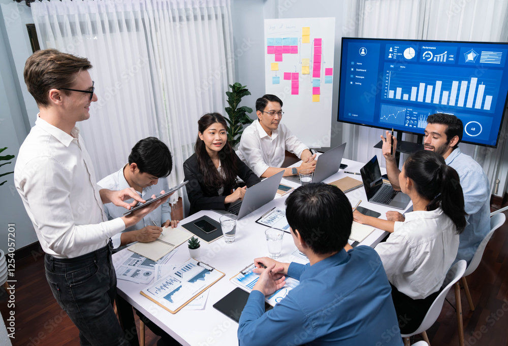 Fototapete Analyst team utilizing BI Fintech to analyze financial data at table in meeting room. Businesspeople analyzing BI dashboard power for business insight and strategic marketing planning. Prudent