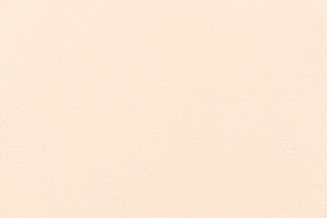 Cream magnolia orange concrete wall texture background.