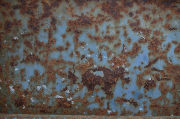 texture of old rusty sheet metal with paint
