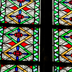 Stained glass as architecture background. Arch-see in Frombork.
