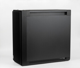 Side view of empty  big tower, PC case, chassis, 15.5 mm front panel grille with 45% porosity for maximum air intake. Studio shoot on white background.