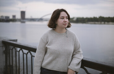 Woman near river, burnout, depression and mental health concept.