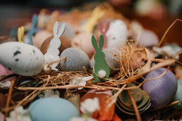 Colorful easter eggs and wooden bunnies creating a festive atmosphere
