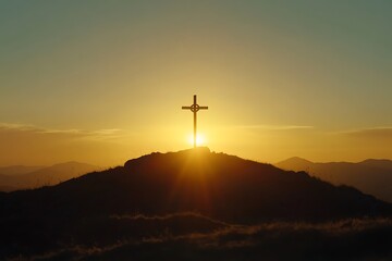 Glowing cross on hilltop against golden sunrise sky