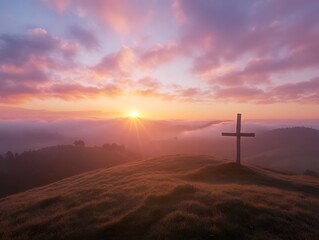 Obraz premium Wooden cross at sunrise with light spilling over hill