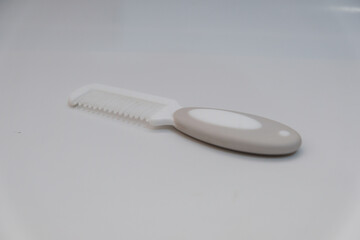 A combs for babies isolated on a white background, baby care, baby equipment