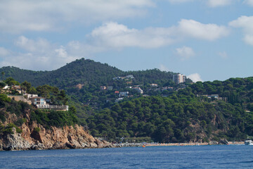 Scenic Coastal View with Hills and Town