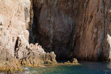 Rocky Coastal Cliff with Clear Blue Water