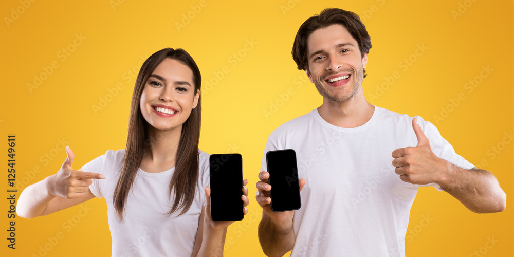 Poster we like this app. portrait of happy couple holding and showing 2 smart phones with black empty scree