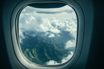       There is a man riding a scooter down the street in the city