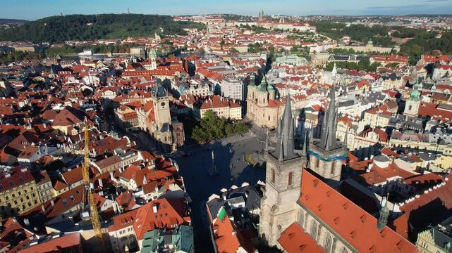 Beautiful Aerial footage of Old town Square, the Astronomical Clock, St. Nicholas Church and the Church of Our Lady before T&yacute;n yn Prague