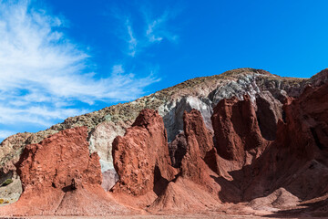 Red rocks and green hills in the arcoiris valley