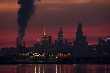 Plume of smoke over the Manhattan skyline at dusk