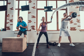 Fototapeta premium Cross Fit. Jumps Rope Exercise And Weight Lifting.