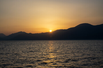 sunset over the sea, garda sea italy