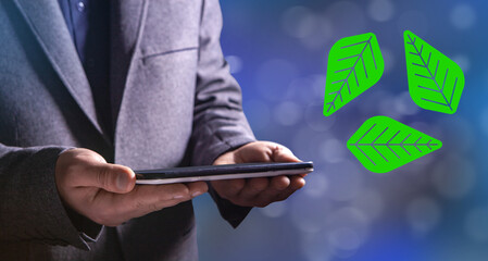 Man and leaf - a sign of biological cycle