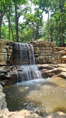 Small waterfall in a landscaped park