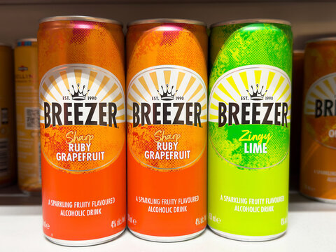 Breezer cans featuring ruby grapefruit and zingy lime flavors on a shelf