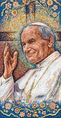 The mosaic of St John Paul II on the Bishop's Palace in Kraków, situated in the window frame from which he used to bless and address crowds. © Adam Ján Figeľ
