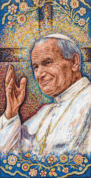 The mosaic of St John Paul II on the Bishop's Palace in Krak&oacute;w, situated in the window frame from which he used to bless and address crowds.