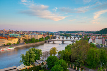 Beautiful view of Prague's riverside and bridges during sunset