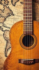 Fototapeta premium Vintage guitar against old world map