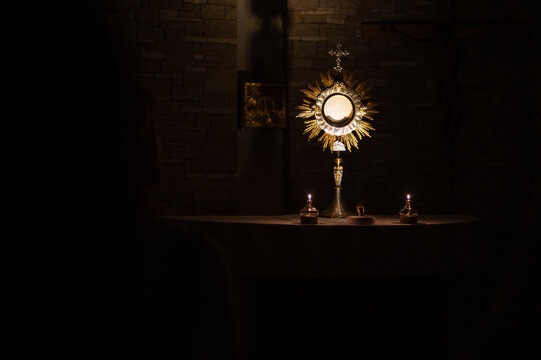 Adoration of the Blessed Sacrament at night in a community chapel in Medjugorje.