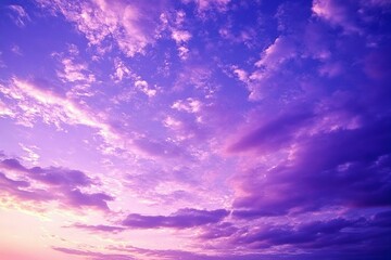 Obraz premium Beautiful purple pink evening sky with clouds view. Colorful sunset background with space for design.