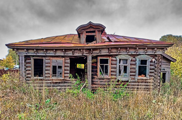 Old ruined wooden house in an abandoned village